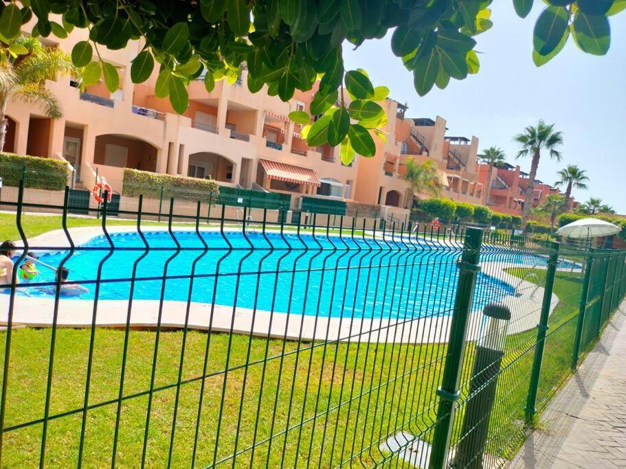 Bajo Con Jardin A Pie De Playa Y Piscina Comunitaria Con Jacuzzi Apartment Playas de Vera Exterior photo