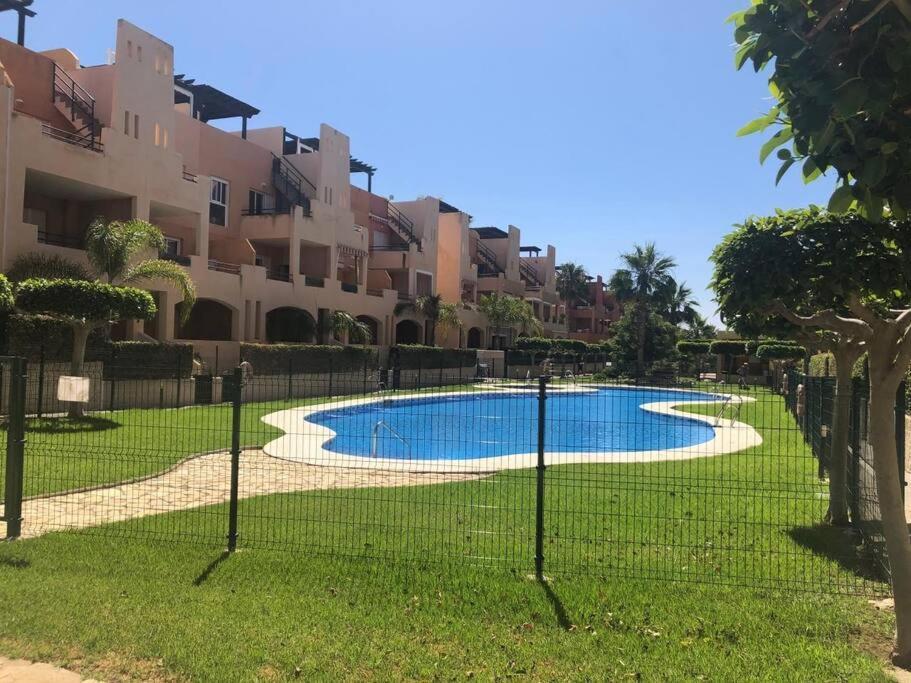 Bajo Con Jardin A Pie De Playa Y Piscina Comunitaria Con Jacuzzi Apartment Playas de Vera Exterior photo